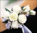 7 White Mini Roses Wristlet from Boulevard Florist Wholesale Market